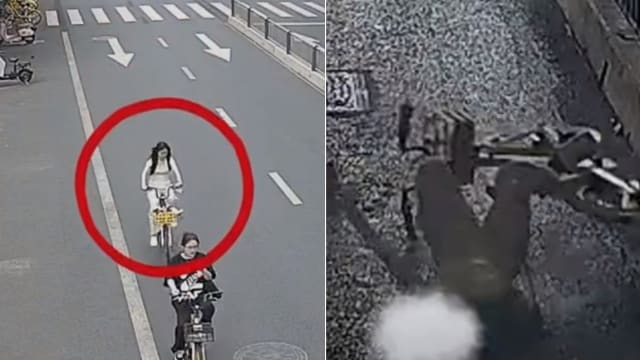 拿着手机骑脚踏车失控 中国女子摔车去世 