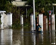 Flooding kills two as Vietnam hit by dozens of landslides