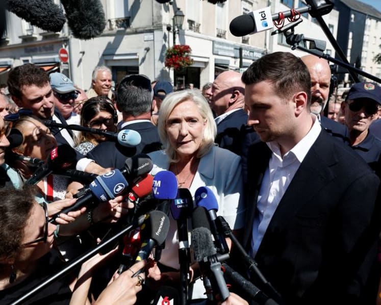 French far right accuses left of threatening "civil peace" if Le Pen wins