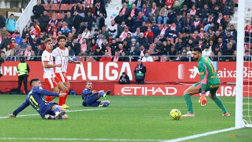 In-form Atletico ease to 3-0 victory at lowly Girona