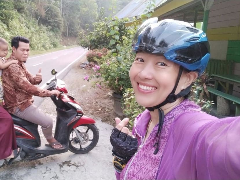 She cycled solo for 1,630km from Singapore to Indonesia to visit her grandfather&rsquo;s birthplace and beyond