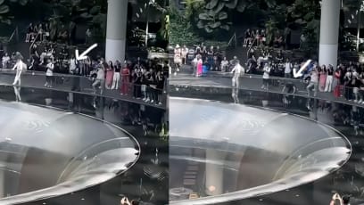 Man Seen Kowtowing To Jewel Changi's Rain Vortex
