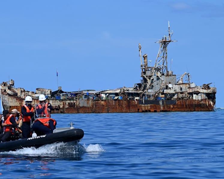 Philippine military says China injured sailor in sea clash
