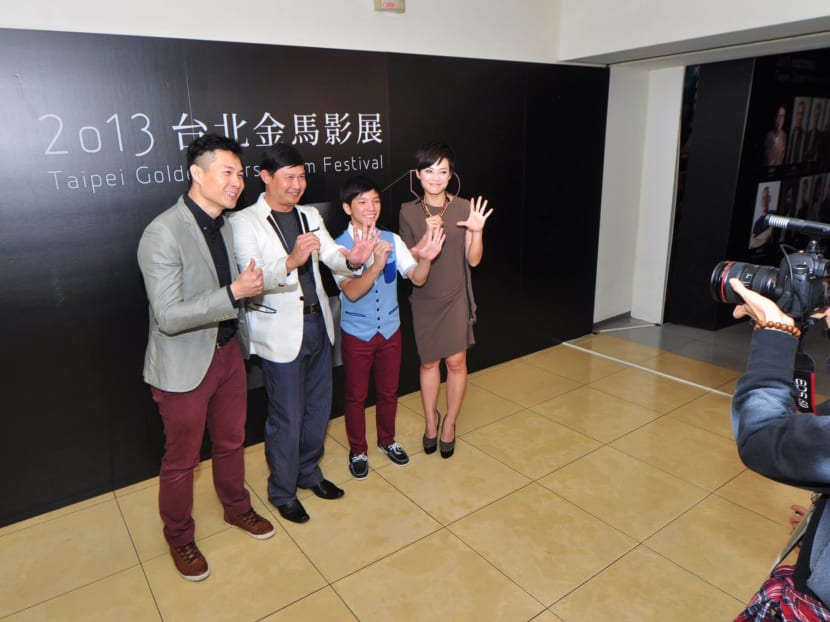 Director Anthony Chen (far left) and the cast of Ilo Ilo at the 2013 Golden Horse Awards. In a country where Hollywood titles dominate, Singapore films are shut out because they do not have the funds to compete for visibility and share of voice, says the author.