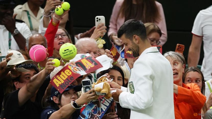 Djoker Djokovic scares ball girl, then eyes McIlroy's Green Jacket