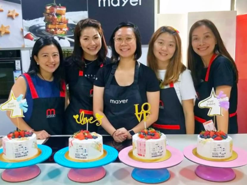 Ms Siti Hartini Hamdi (third from left) with students at a cake-making workshop she held before the circuit breaker started in early April 2020. She has trouble finding baking ingredients now. Ms Siti Hartini Hamdi (third from left) with students at a cake-making workshop she held before the circuit breaker started in early April 2020. She has trouble finding baking ingredients now.