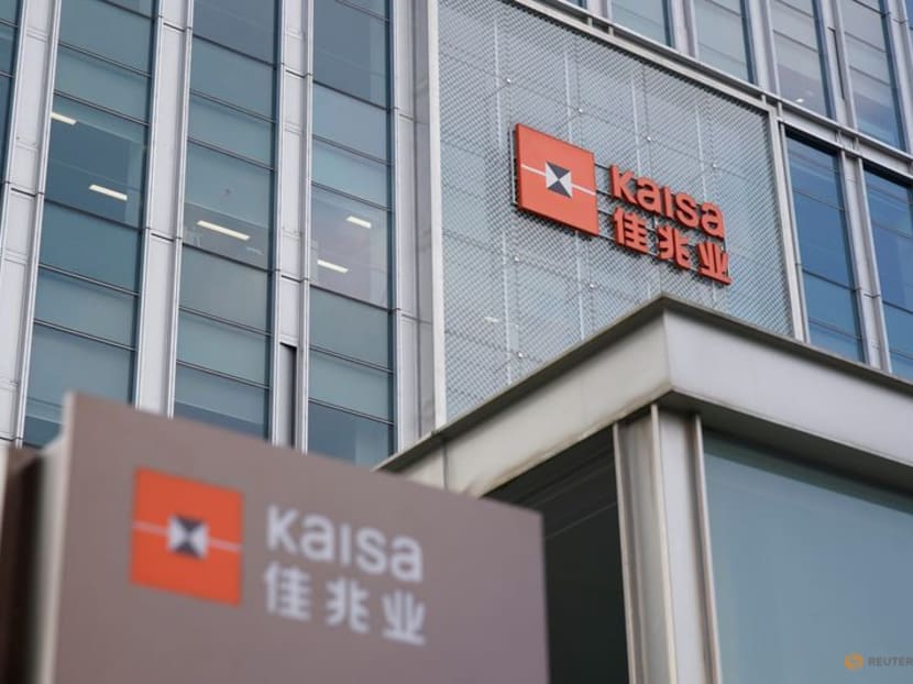 FILE PHOTO: Signs the Kaisa Holdings Group are seen at the Shanghai Kaisa Financial Centre, in Shanghai, China, December 7, 2021. REUTERS/Aly Song/File photo