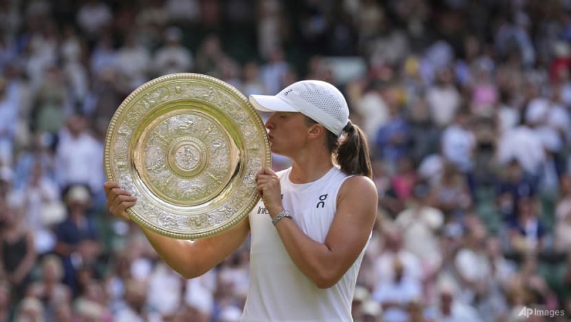Swiatek thrashes Anisimova 6-0 6-0 to win Wimbledon title Swiatek thrashes Anisimova 6-0 6-0 to win Wimbledon title