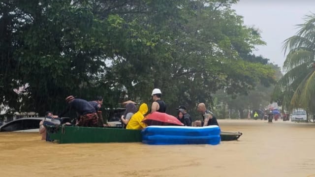 马国春节遭遇暴雨洪灾 受灾人数增至逾1万2000人