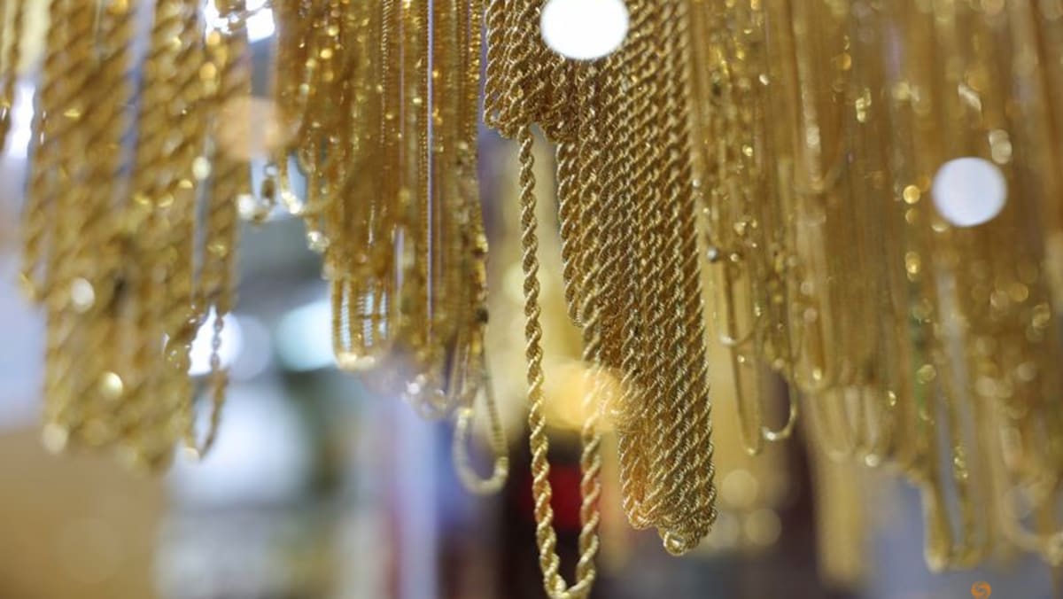 Gold retreats after hitting all-time high on Trump tariffs