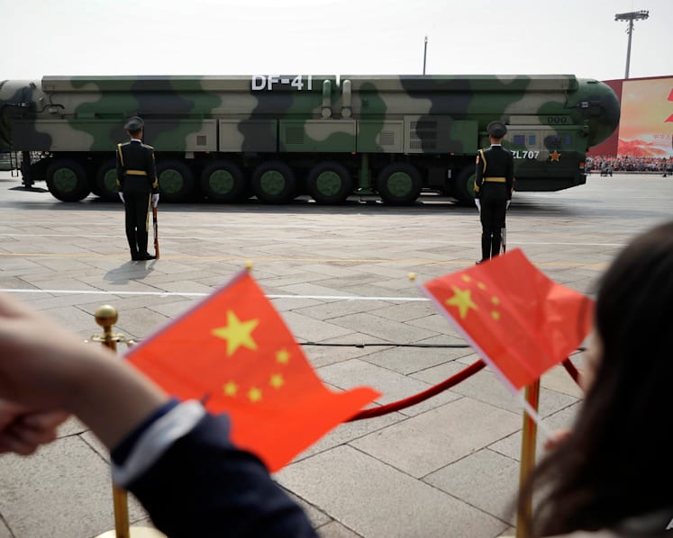 Why did China test-fire an ICBM into the Pacific Ocean and what are the likely implications?