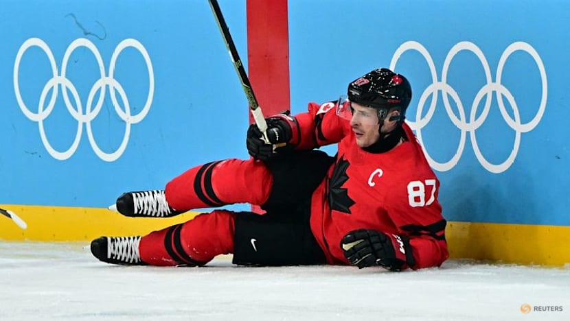 Ice hockey-'Go get it, boys': Injured Crosby's pep talk powers Canada quarter-final comeback