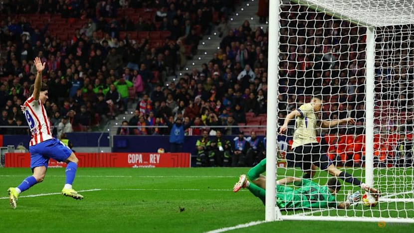 Atletico hit Barcelona for four to take giant step toward Copa del Rey final