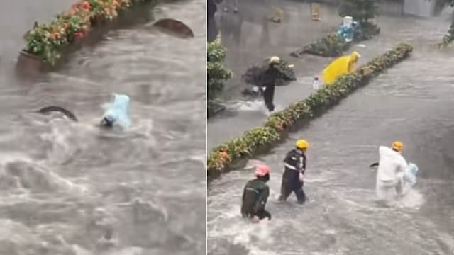广州暴雨积水湍急 三外送员勇救男童