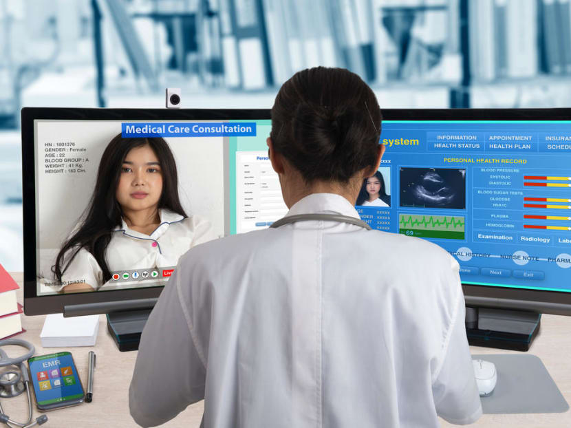 A doctor giving a patient an online consultation.