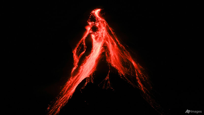 Philippines' Mayon Volcano spews lava down its slopes in gentle eruption, putting thousands on alert