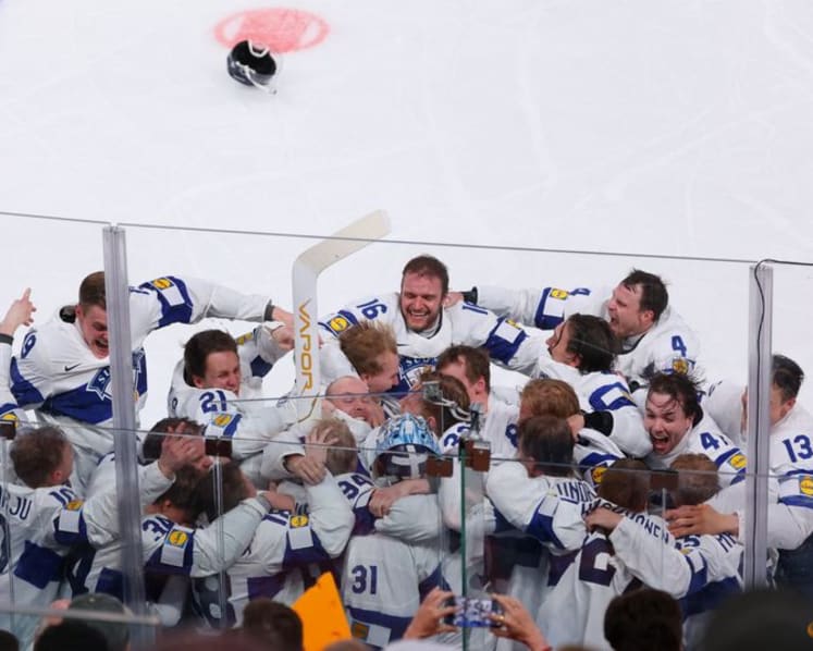 Ice hockey-Helenius is the hero as Finland beat Swiss in world final