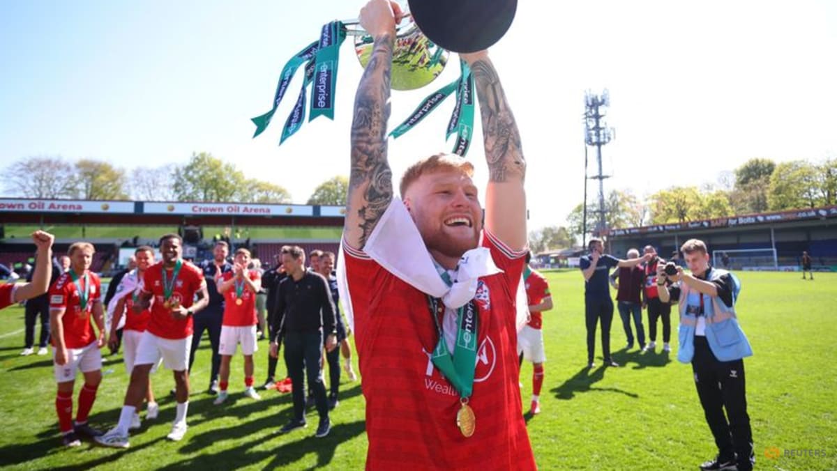 York City promoted to League Two after dramatic draw with title rivals Rochdale