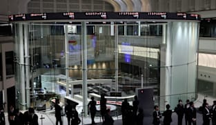 Japan's Nikkei hits record high as chip-related shares jump