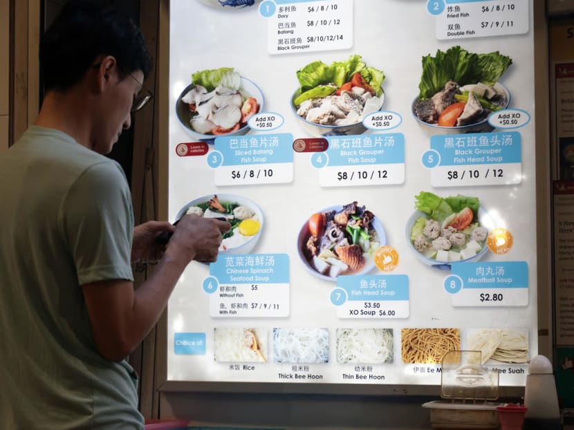 A menu displayed at a hawker stall selling fish and seafood soup, at Pasir Ris Central Hawker Centre on July 12, 2024. A menu displayed at a hawker stall selling fish and seafood soup, at Pasir Ris Central Hawker Centre on July 12, 2024.