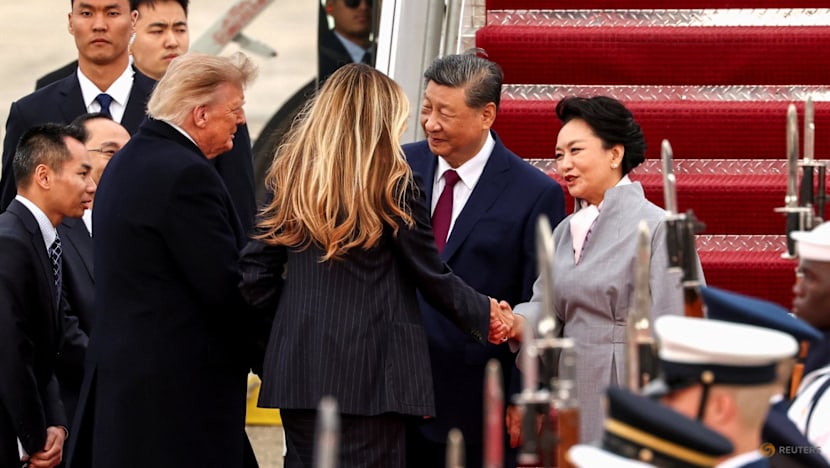 China’s Xi arrives in Washington, kicking off his state visit with rare planeside welcome from Trump