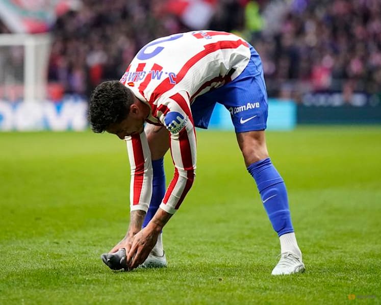Gimenez swoops in after pigeon pauses Atletico match