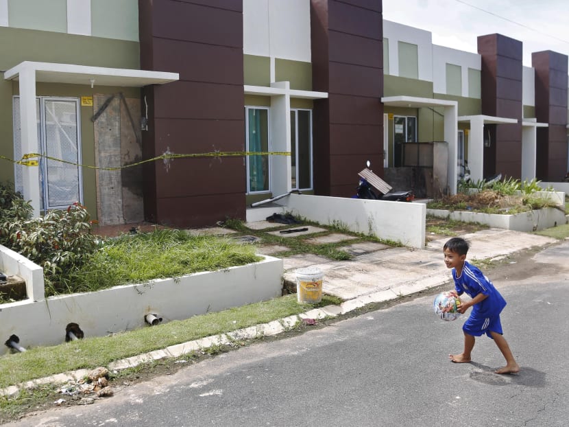 The Big Read: At Singapore’s doorstep, a toxic cocktail of apathy and lax security