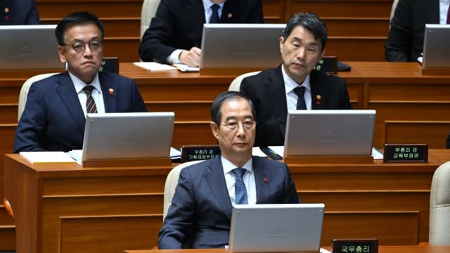 临危受命接任韩国代总统 李周浩：将确保政府稳定运作