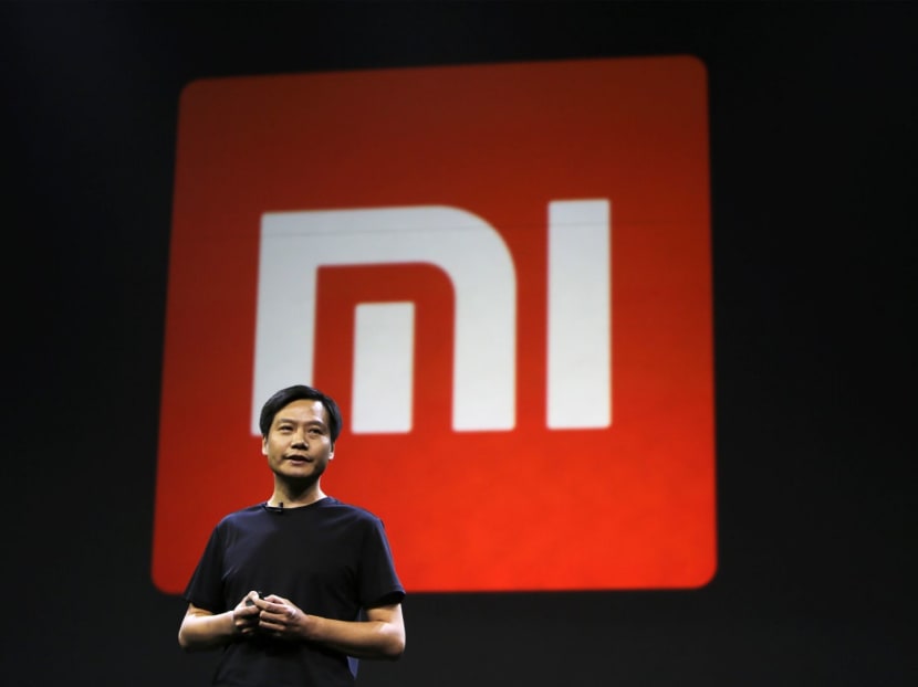 Founder and CEO of China's mobile company Xiaomi Lei Jun speaks at a launch ceremony of Xiaomi Phone 4, in Beijing.