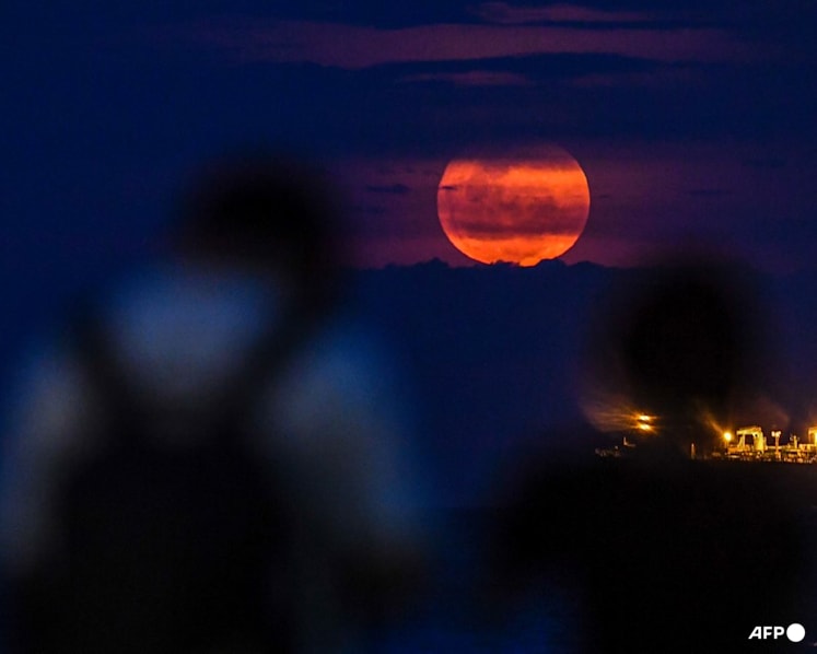 Named after blooming flowers, Pink Moon dazzles despite cloudy skies in Singapore