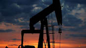 Oil settles higher as hopes of peace in the Middle East dwindle