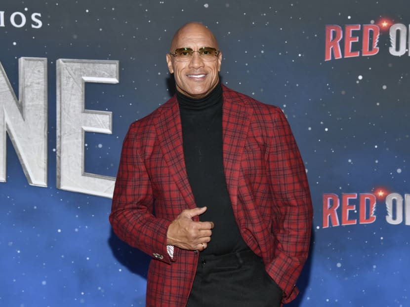 Actor Dwayne Johnson admits to urinating in bottles on set to save time Actor Dwayne Johnson admits to urinating in bottles on set to save time