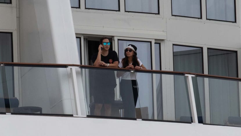 Some initial shock, a honeymoon cut short, but passengers largely unfussed at being onboard cruise ship with Covid-19 case