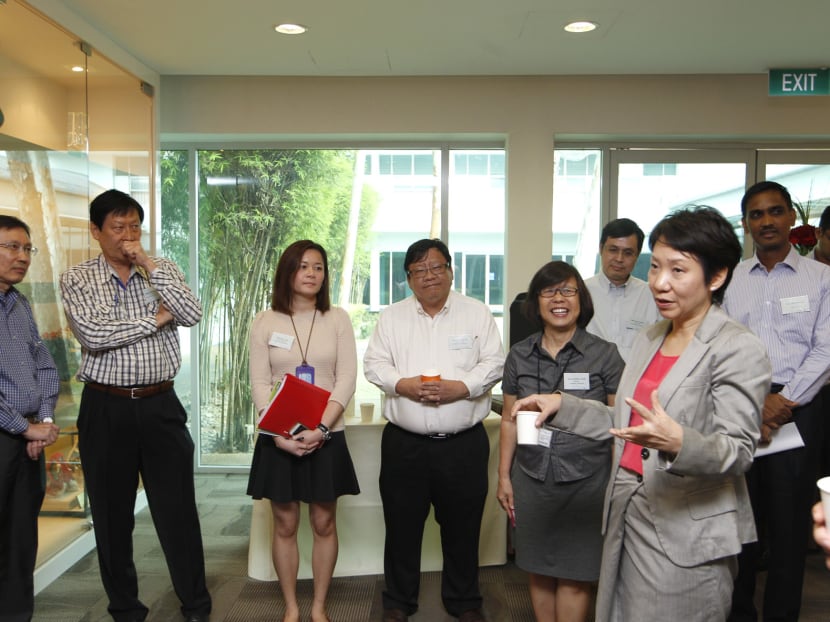 Minister for Prime Minister's Office Grace Fu speaking with LTA staff on Sept 22. Photo: Wee Teck Hian