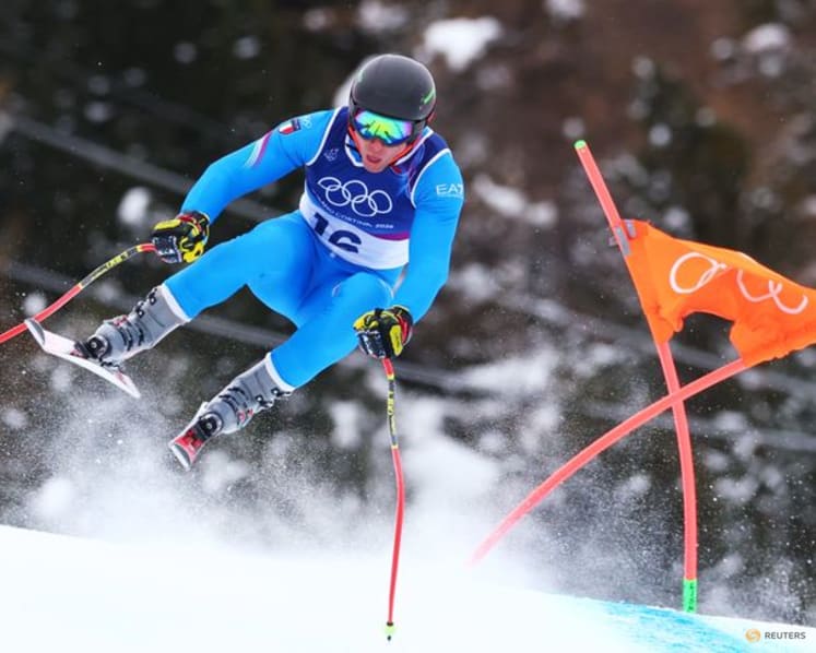 Alpine skiing-Italian trio set pace in sun-kissed downhill training