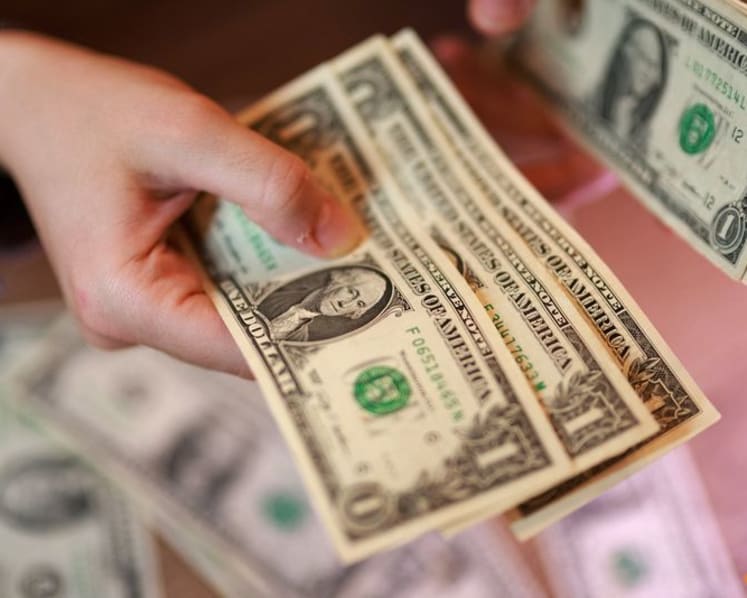 Dollar hits 3-month low vs euro, pares losses after Treasury move