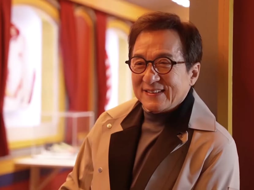 Jackie Chan's first time at Milan Fashion Week has fans amused as he looks like he 'accidentally wandered' in