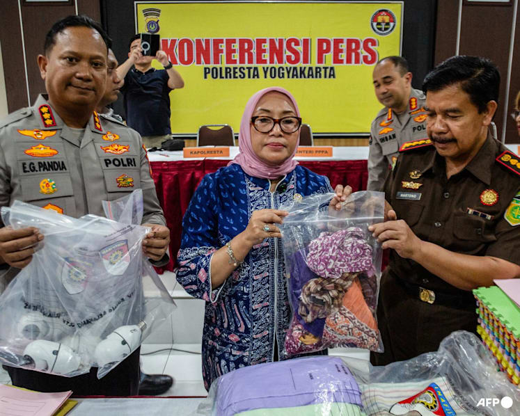 Indonesian police charge 13 in daycare abuse scandal