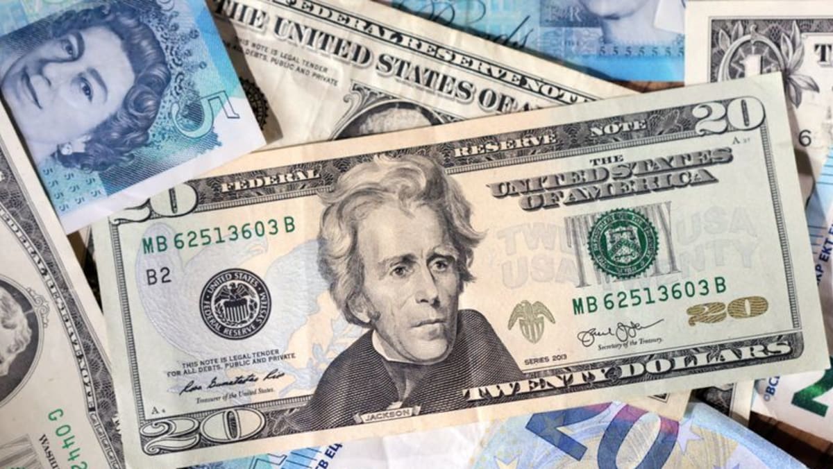 Dollar trades sideways before tax vote, Aussie holds gain before RBA - Channel News Asia (Picture 1)
