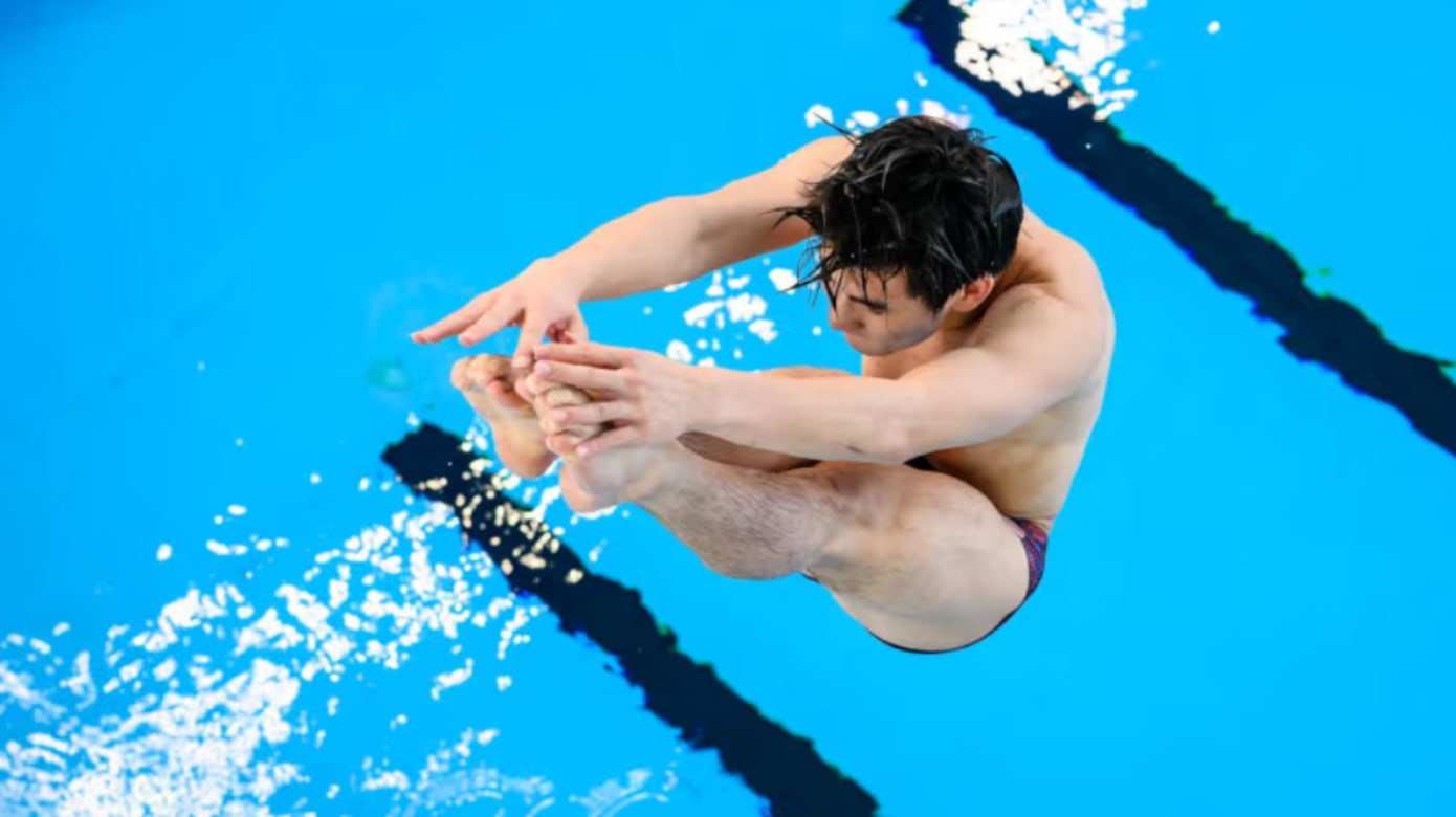 跳水项目开赛首日 谭柏伦1米跳板捎金喜