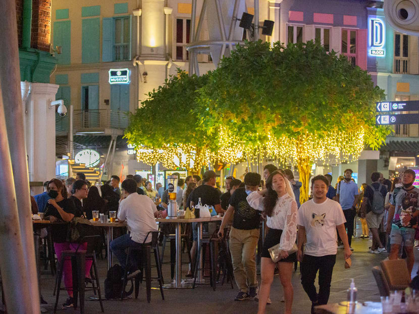 A scene at Clarke Quay on March 29, 2022, the first day that Covid-19 infection controls were eased to allow late-night drinking at eateries.