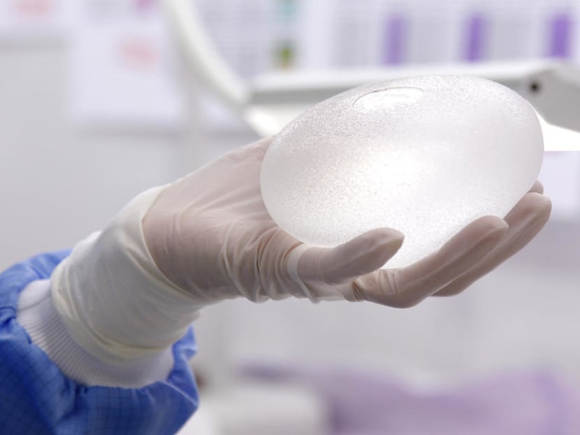 The 30-year-old's left breast implant deflected the bullet away from her vital organs into the other breast, according to a case study published last week in the SAGE medical journal. The 30-year-old's left breast implant deflected the bullet away from her vital organs into the other breast, according to a case study published last week in the SAGE medical journal.