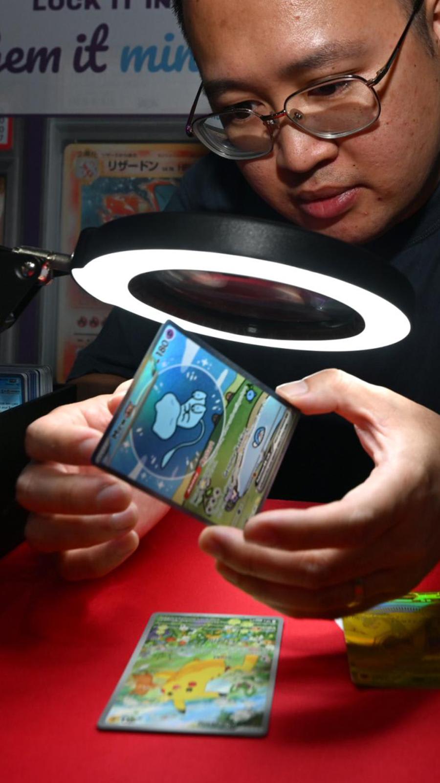 Amid Singapore’s card collecting craze, a specialised trade scrutinising rare trading cards is emerging