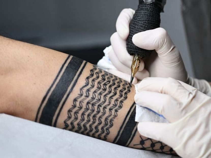 Palestinian keffiyeh scarves - a controversial symbol of solidarity