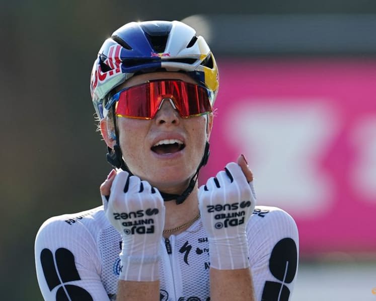Vollering wins stage eight, takes Tour de France Femmes overall lead