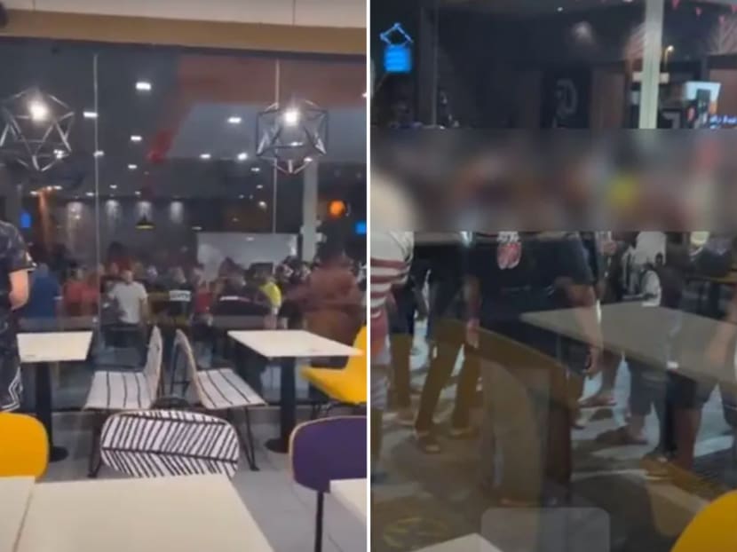 Screenshots from a Facebook Live by Ms Tramy Leong showing a large crowd of people surrounding the McDonald's outlet she and her family are hiding in.