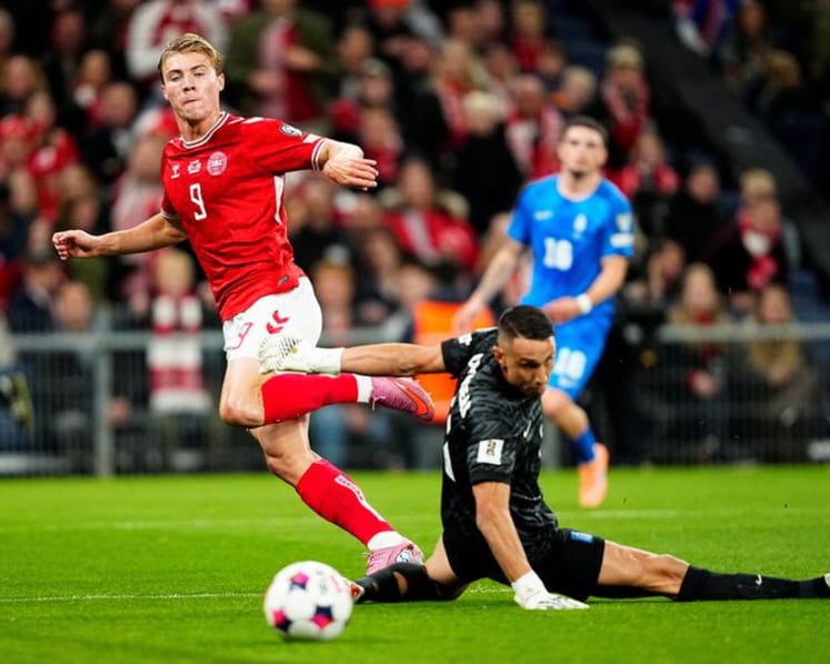 Denmark stay top with 3-1 World Cup qualifying win over Greece