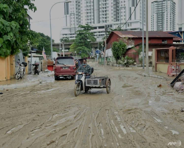 Commentary: Floods, inflation and COVID-19 - Malaysians have had it rough