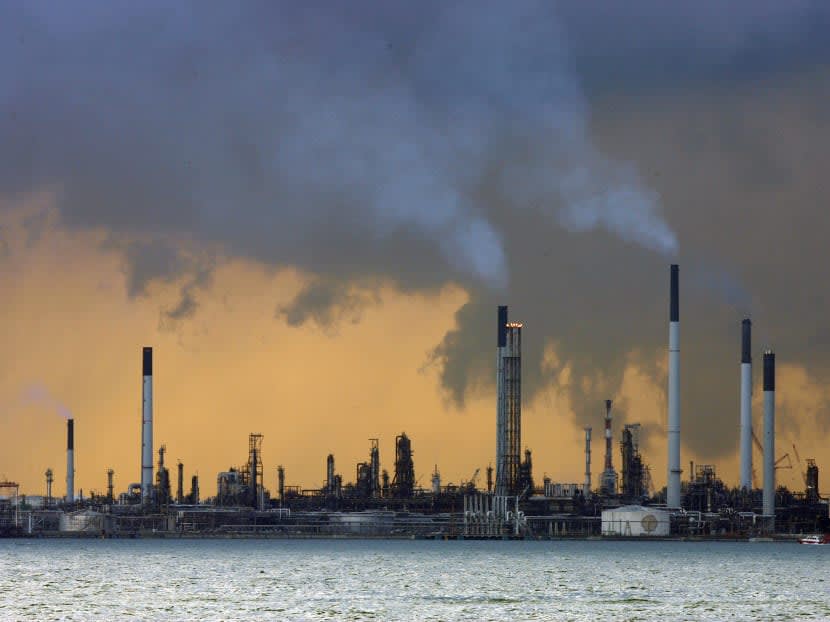 A view of an oil refinery off the coast of Singapore. A view of an oil refinery off the coast of Singapore.