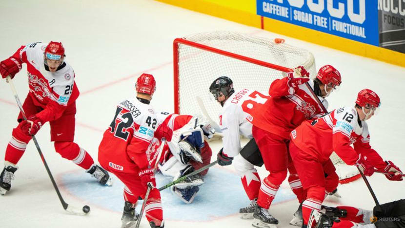 Ice hockey-Denmark stun Canada, Swedes beat Czechs to reach world championship semis